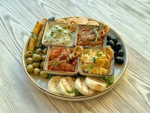 Wine set with four sauces and crackers