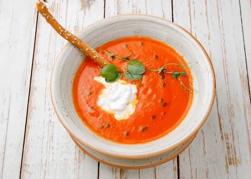 Tomato soup with stracciatella cheese